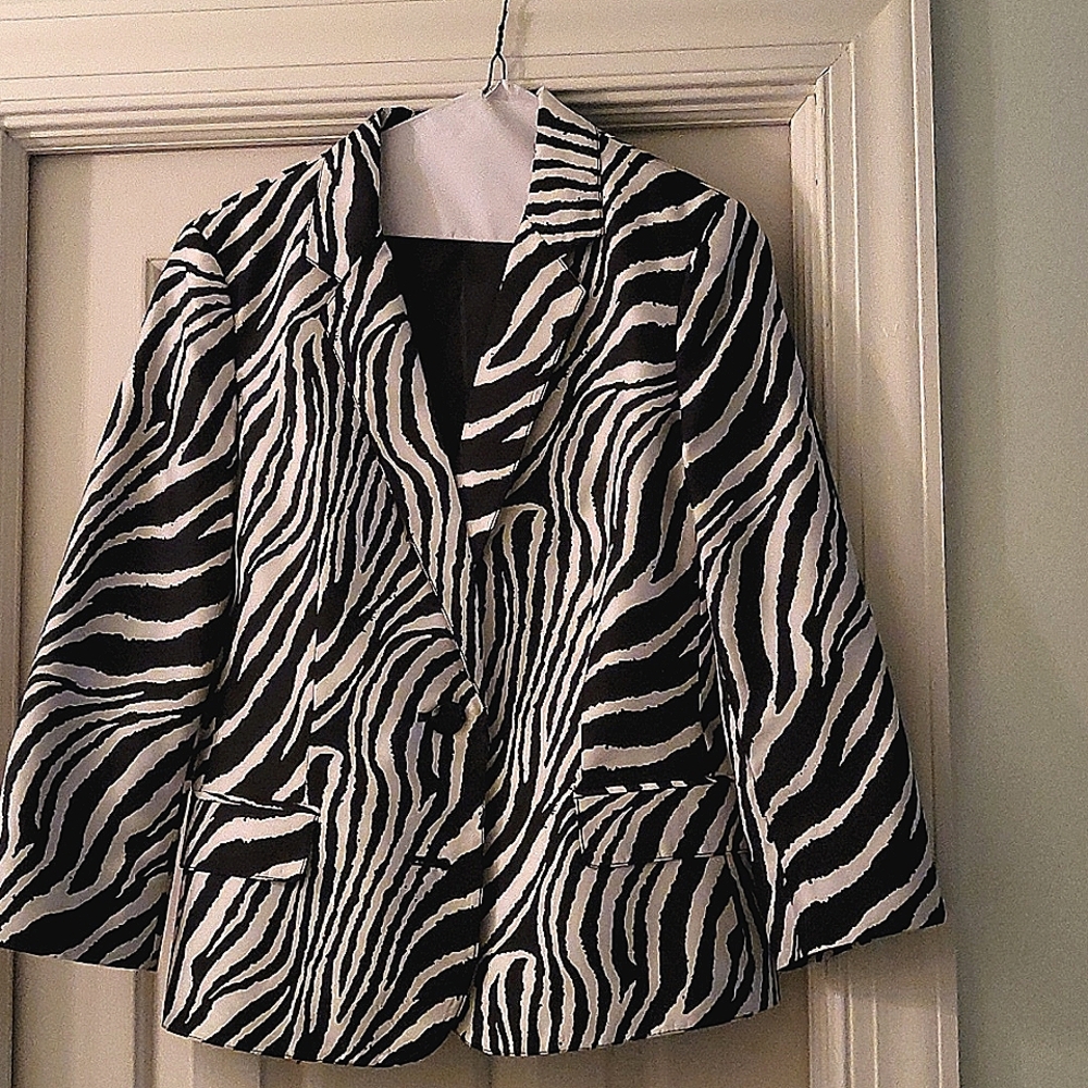 Leopard print jacket with two front bottons. John Meyers size 12